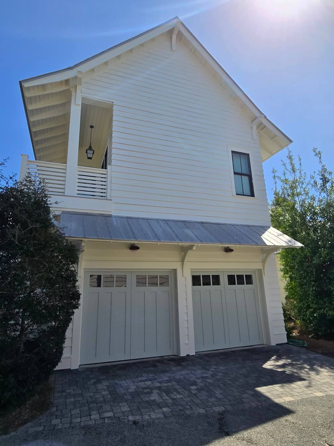 Two-story carriage house with double garage